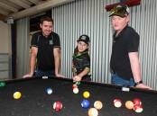 Wagga Boys to the Bush facility manager Ben Walsh was thrilled as the organsiation officially opened in town on Wednesday. He is pictured with Kaiden Hinch, 10 and Slade Barker, 16. Picture by Les Smith