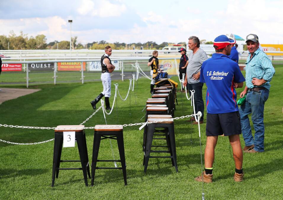SAFETY MEASURES: A makeshift fence was installed at Murrumbidgee Turf Club on Monday to keep a safe distance between jockeys and trainers. Picture: Emma Hillier