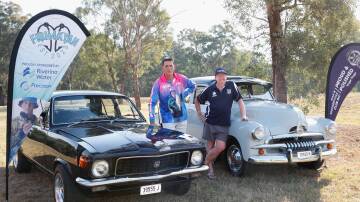 Fishing for Kyan founder and uncle of the late Kyan Armstrong Damian Armstrong withProud and Polished Car Club president Roy Denton. Picture by Tom Dennis