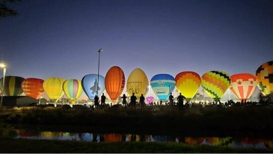 A large number of people were captivated by the colourful beauty of hot air balloons as part of a crowd pleasing Microtech DPS Balloon Glow on Sunday. Picture supplied