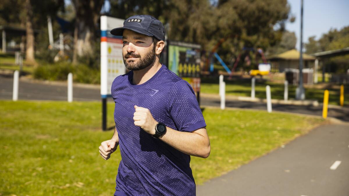 Dean McCallum is running 50 half marathons in 50 days to raise money and awareness for Epilepsy Action Australia. Enduring the pain is also a show of solidarity with people afflicted with the condition. Picture by Ash Smith