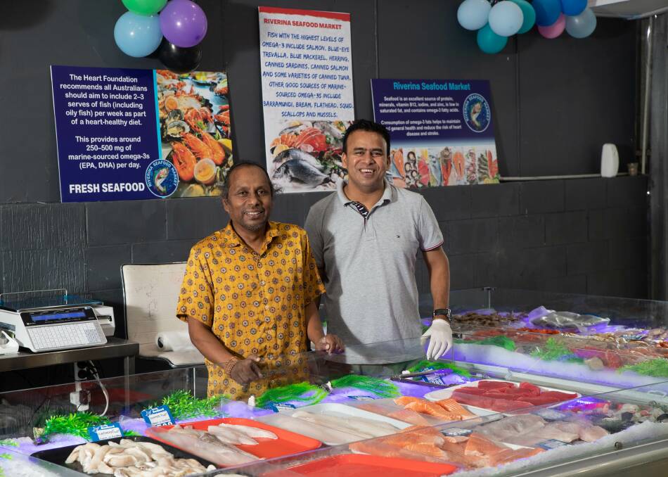 Owners of Wagga's newest and only seafood store Dr Milton Hasnat and Ryan Martin want to make the heart attack capital of Australia healthier. Picture by Madeline Begley 