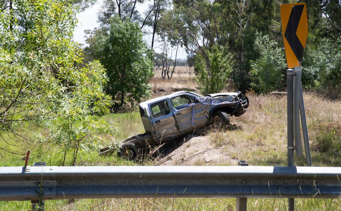 The wreckage of a Nissan Navara which rolled into a creek near Lake Albert after a horror smash on Friday afternoon. The tray in the foreground ripped completely off the truck. Picture by Madeline Begley 