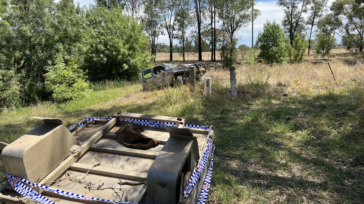The wreckage of a Nissan Navara which rolled into a creek near Lake Albert after a horror smash on Friday afternoon. The tray in the foreground ripped completely off the truck. Picture by Conor Burke 