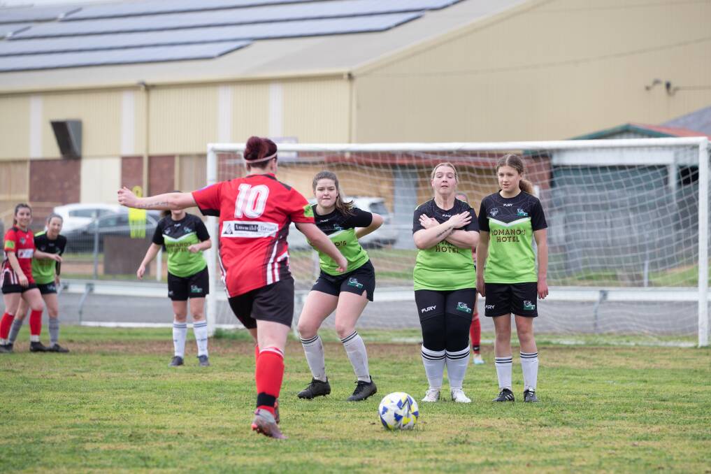 Jessica Peters, Katelyn Worldon and Elizabeth Evers prepare for a penalty in South Wagga's women's Madden Shield game against Temora at Wagga Showground on August 13. Picture by Madeline Begley.