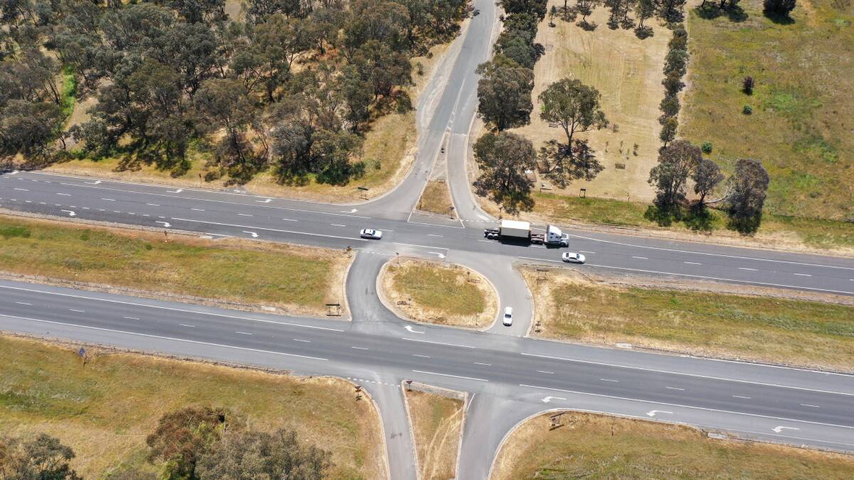 Wenkes Road, above, with a truck heading east towards Chiltern on the Hume Freeway and Old Cemetery Road on the other side of the freeway, below. Picture by Mark Jesser