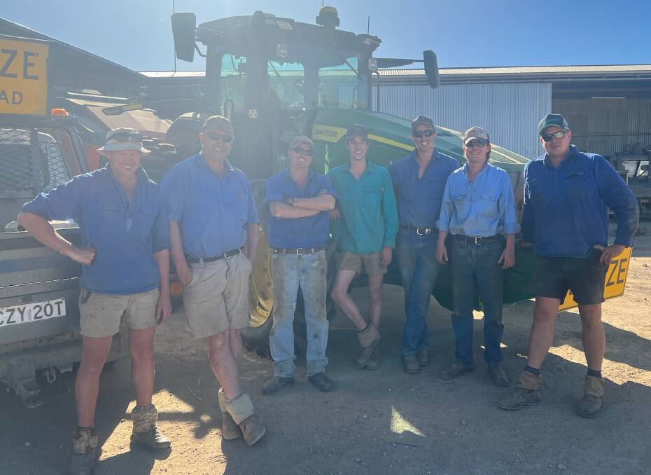 Matt Lane (third from left) with his team as they wrapped up harvest a week out from Christmas to the west of Wagga. Picture contributed