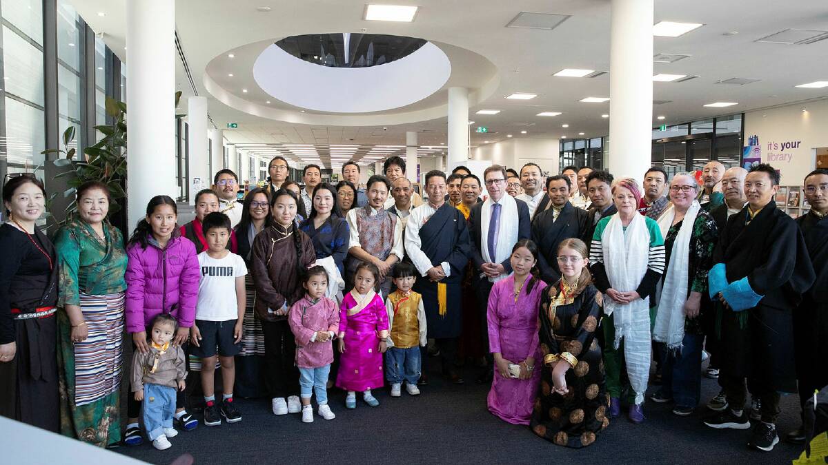 Members of Australia's Tibetan community gathered to hand over a collection of Tibetan books to the Wagga Library on Sunday morning. Picture by Madeline Begley