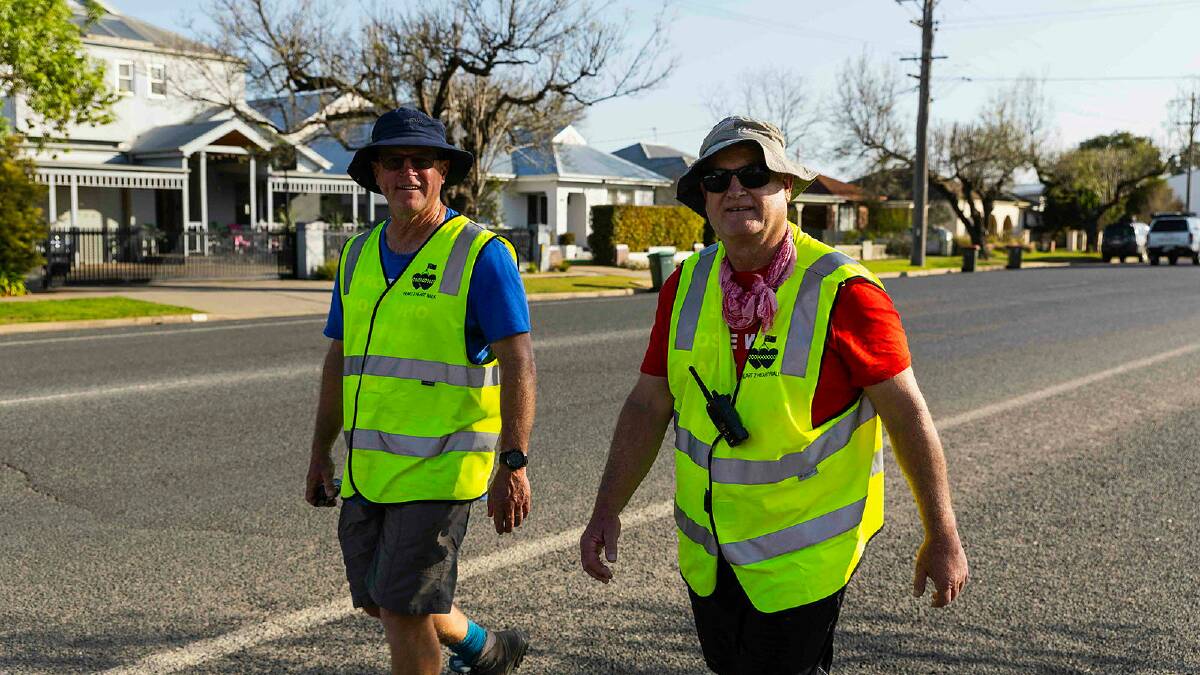 Heart2Heart walkers Greg Corin and retired firefighter Bruce Cameron on the streets of Wagga last Friday. Picture by Ash Smith