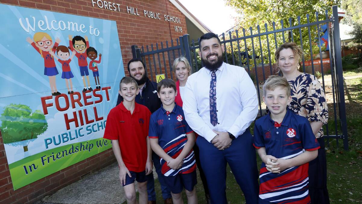 Forest Hill Public School principal Anthony Celi with year 6 students Archie Splithof, Harrison Dobson and Thomas Hutchinson, and teachers Zach Jackson, Sophia Brodie and Jo Bowen. Picture by Les Smith