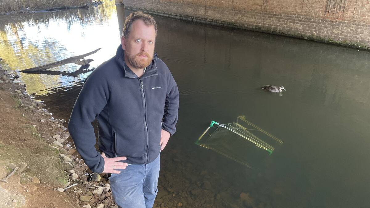 NOT HAPPY: Wagga Urban Landcare vice president Steve Moore is calling for greater measures to clamp down on trolley dumping in our waterways. Picture: Andrew Mangelsdorf
