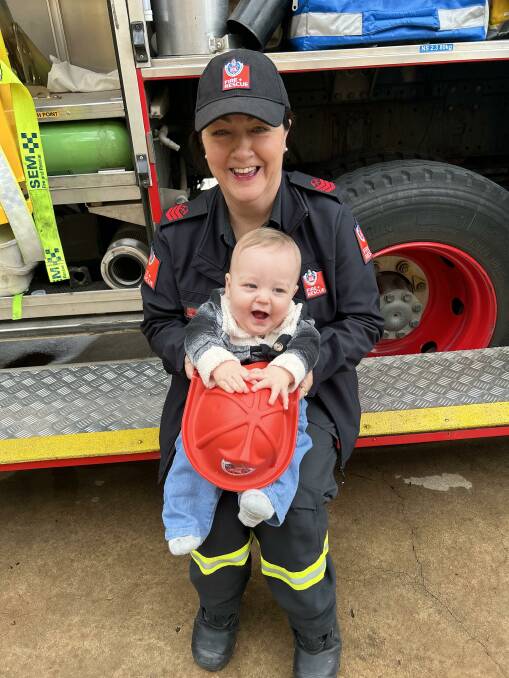 Wagga FRNSW station retained firefighter Sharon Spackman with her 11-month-old grandchild, Kingston McGuire at the open day on Saturday. Picture contributed