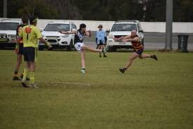 Coolamon defender Campbell Mattingly gets a kick away during the Hoppers clash against Leeton-Whitton back in round four. Mattingly was one of Coolamon's best in their 123-point win over the Crows at Kindra Park. Picture by Liam Warren
