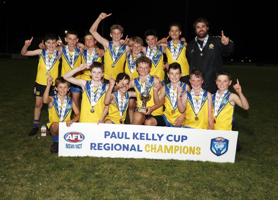 Lake Albert Public School celebrates their Paul Kelly Cup win after defeating Mater Dei Primary School in Wednesday night's final. Picture by Les Smith