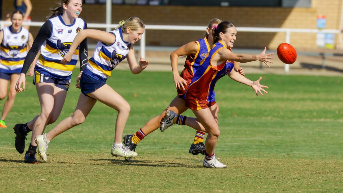 Mater Dei's Georgina Hayes breaks out of the pack during their Kendall Cup gala day clash against Kooringal High. Picture by Bernard Humphreys