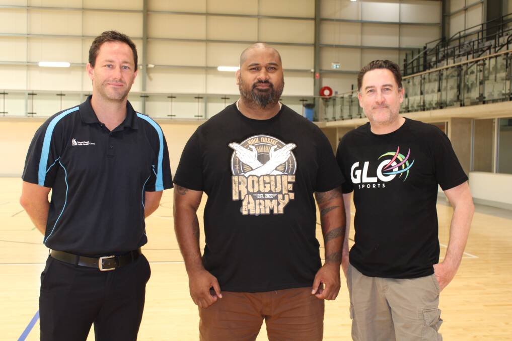 Oasis Aquatic Centre Manager Marc Geppert, NJPW's Bad Luck Fale and event co-promoter Cam Vale from GLO Sports check out the facilities at the multi-purpose stadium. Picture by Jimmy Meiklejohn