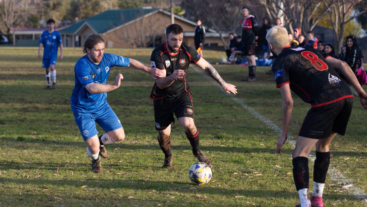 Adam Raso beats his defender Henry Shears during a 2023 Pascoe Cup game.