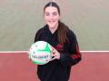 Jess Walker, 14, has been balancing junior and senior netball this season. Picture by Les Smith