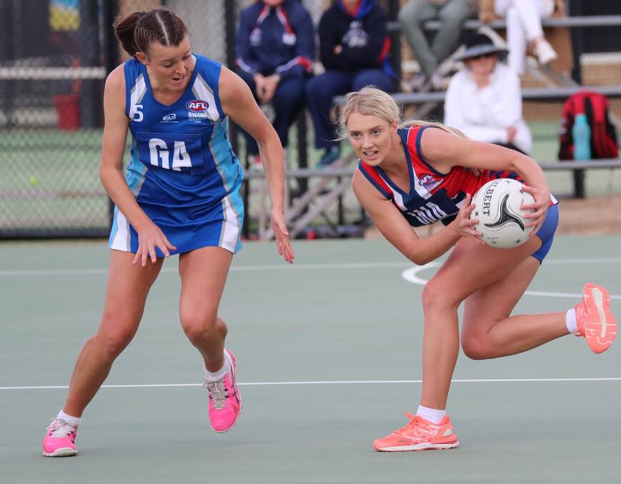 Sarah Hillier and Mikaela Cole compete for a loose ball during the 2018 Riverina League v Farrer League representative match. Picture by Les Smith