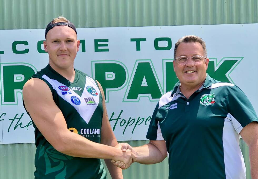 Coolamon's new ruck Adian Ledson shakes hands with incoming first grade coach Gavin McMahon ahead of his first season at Kindra Park. Picture supplied