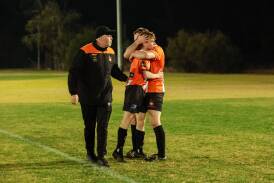 Wagga United's Ben Mitchell congratulated by playing coach Jayden Beattie and co-coach Travis Weir after he scored against South Wagga at Rawlings Park in round nine. Picture by Bernard Humphreys