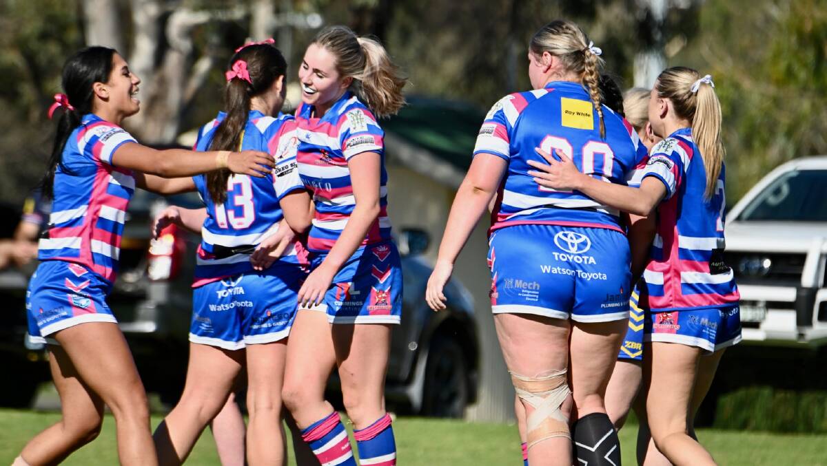 Young Cherry Bombs celebrate a try during their round two game with Junee. Picture by Young Cherrypickers RLFC