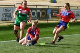 Jessica Jolliffe scores Kangaroos' only try for the day against Brothers while Maranda Carberry chases to tag and Kate Pevere comes in to celebrate. Picture by Tom Dennis