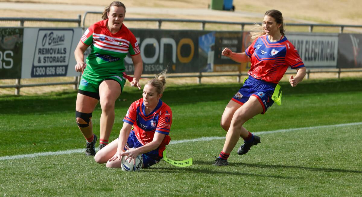 Jessica Jolliffe scores Kangaroos' only try for the day against Brothers while Maranda Carberry chases to tag and Kate Pevere comes in to celebrate. Picture by Tom Dennis
