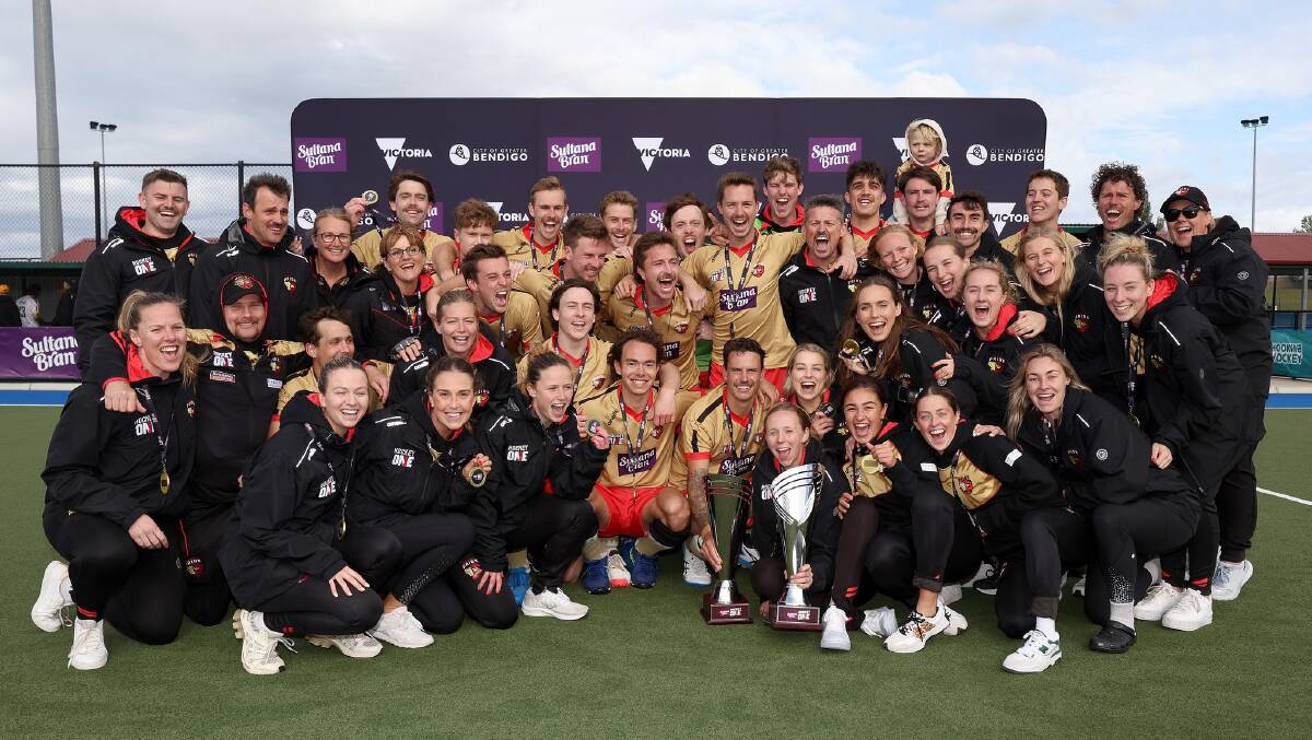 NSW Pride women's and men's teams after the club won both Hockey One premierships on Sunday in Bendigo. Picture by Hockey One