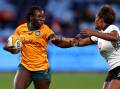 Biola Dawa is tackled during the women's International Test match between the Wallaroos and Fijiana at Allianz Stadium on July 06, 2024 in Sydney, Australia. Picture by Jason McCawley/Getty Images