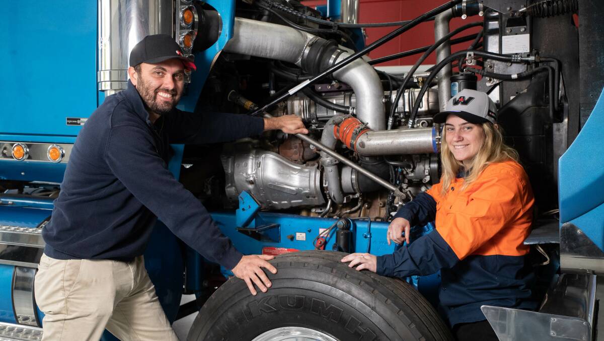 TAFE NSW teacher Justin Haddrill with heavy vehicle apprentice Chloe Raynes. Picture by Madeline Begley 