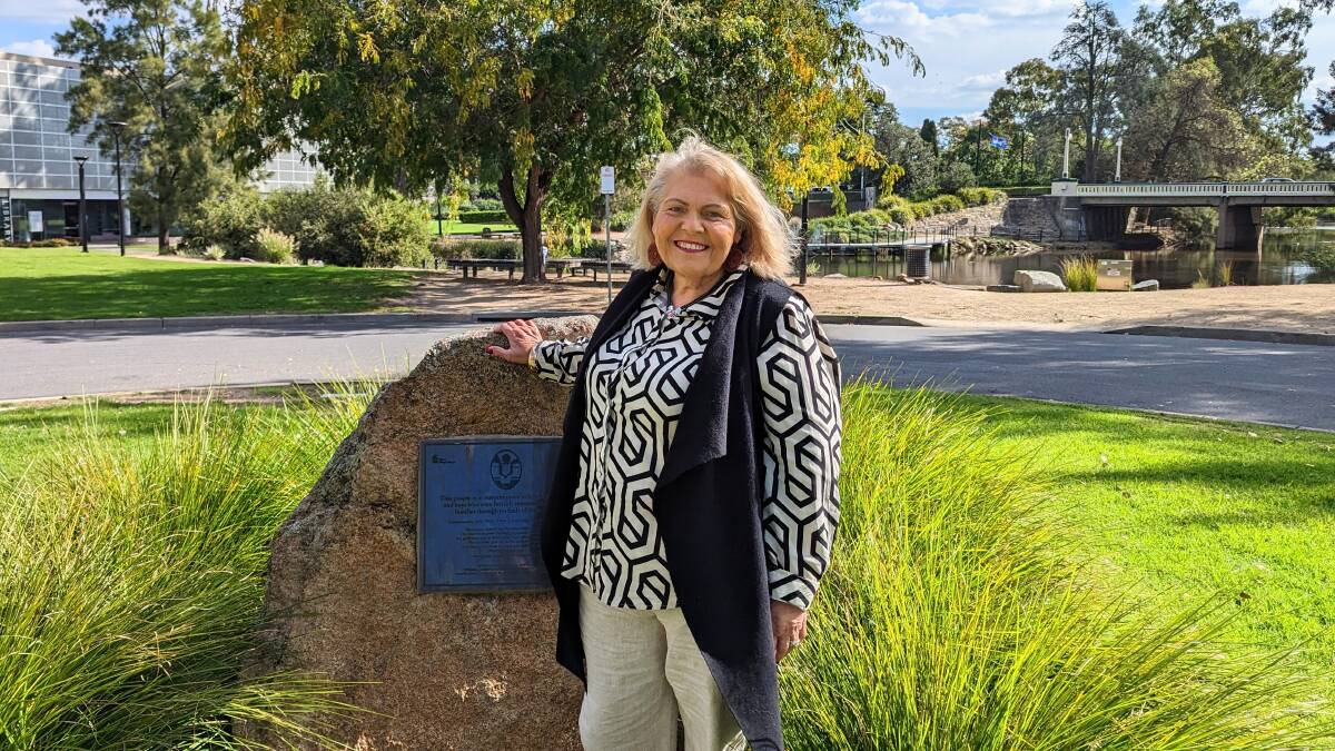 'This can never be allowed to happen again'. Aunty Mary Atkinson in front of the Sorry Rock at Wollundry Lagoon. Picture by Dan Holmes.