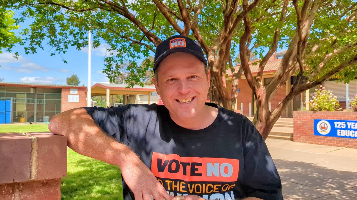 No campaigner Cam O'Kane handing out at South Wagga Public School on poll day. Picture by Dan Holmes