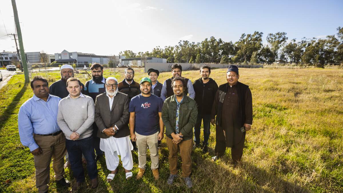 MARAWA members gather after prayers at the future site of Wagga's first mosque. File picture by Ash Smith