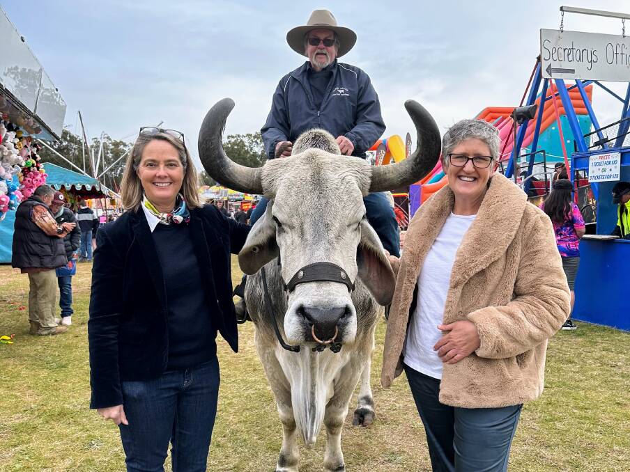 Charlie the Ridden Steer with rider Gary Nelson, Ganmain Show Society Treasurer Catherine Cruikshank and Secretary Kendra Kerrisk. Picture supplied