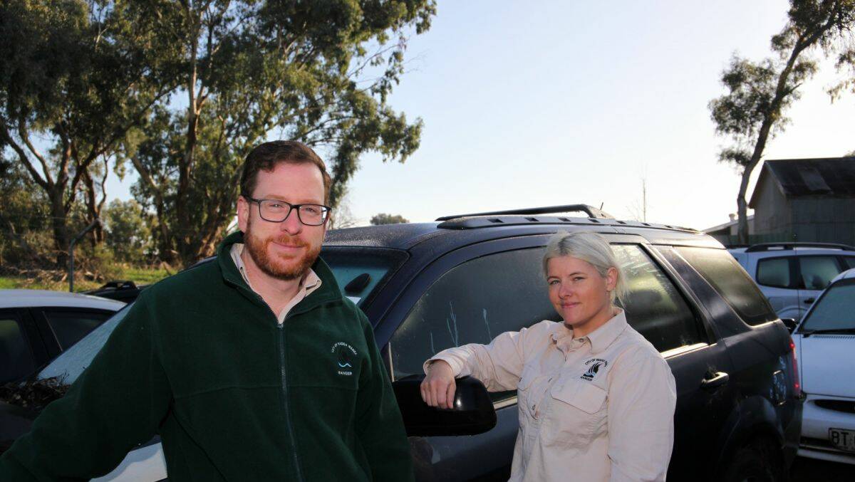 Wagga City Council Rangers Jason Maybury and Maddison Seymour with the impounded cars. Picture supplied
