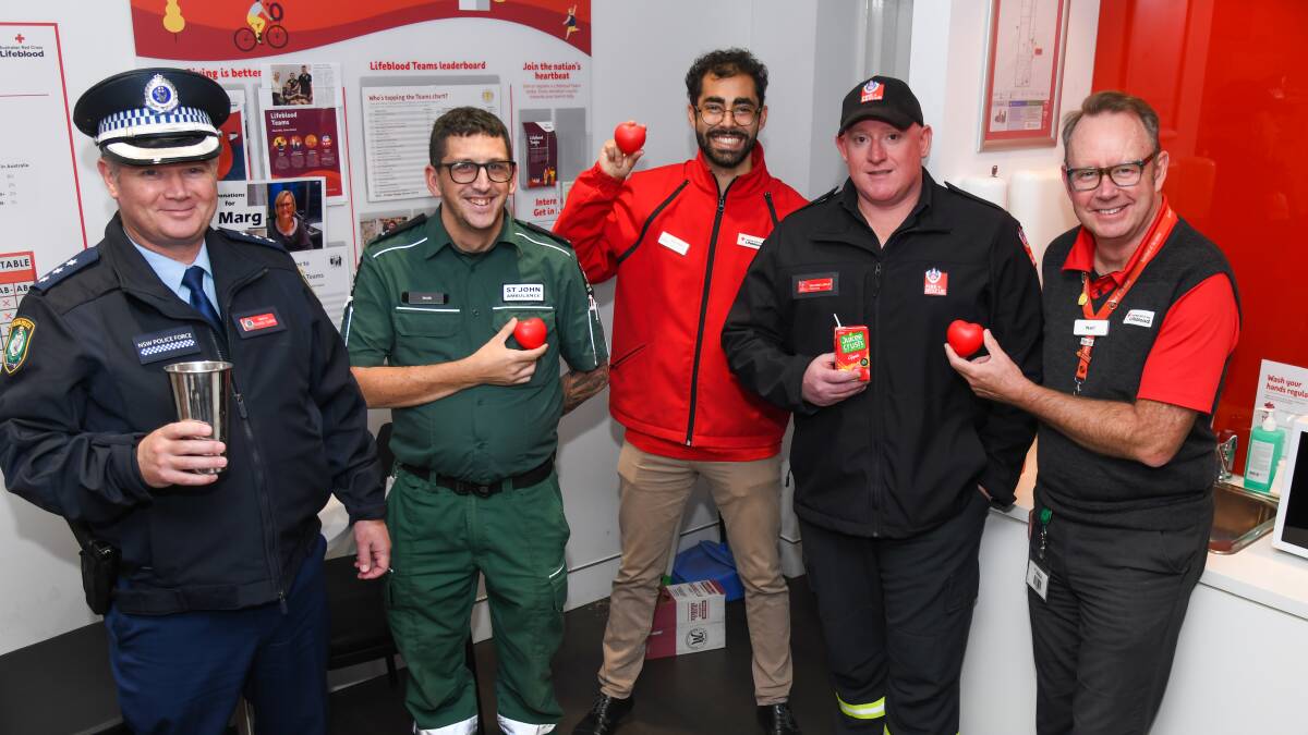 Police Inspector Rowan Harris, St John Ambulance volunteer Jacob Chapple, Lifeblood's Mitch Bryce, firefighter Ben Lesslie and Lifeblood Wagga manager Neil Wright at the Lifeblood Wagga Donor Centre. Picture by Bernard Humphreys