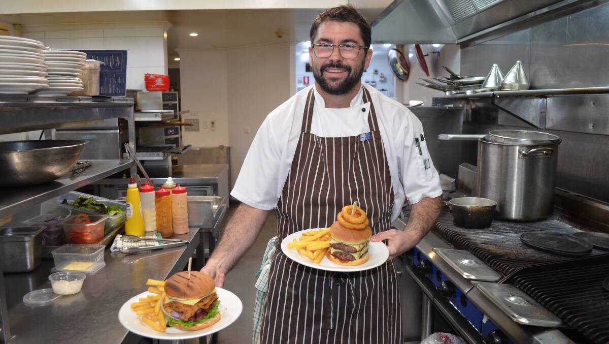 Kooringal Hotel head chef Ryan Dedini, celebrating international burger day. Picture by Jeremy Eager. 