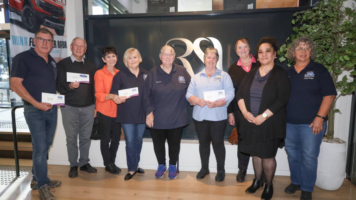 The Riverina Ford Owners Club presenting over $8000 dollars in donations. Picture by Tom Dennis 