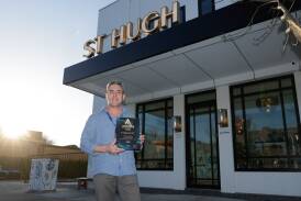 St Hugh Hotel venue manager Tom Denahy holding their highly commended award. Picture by Tom Dennis
