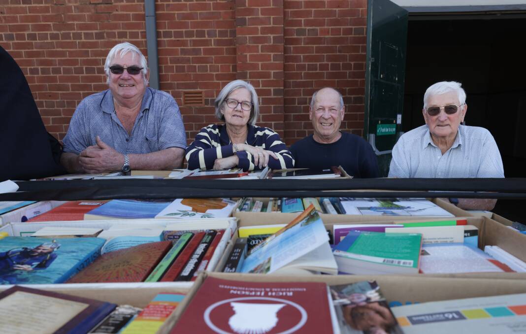 Rotary Club of Wagga Wagga's Graham Russell, Vicky Donoghue, Dave Wynne and John Heazlewood have been hard at work setting up the 2024 Book Fair. Picture by Tom Dennis