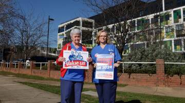 NSW Nurses and Midwives' Association's Karen Hart and Jo Richens at the corner outside Wagga Base Hospital where nurses and midwives will rally on Thursday. Picture by Tom Dennis