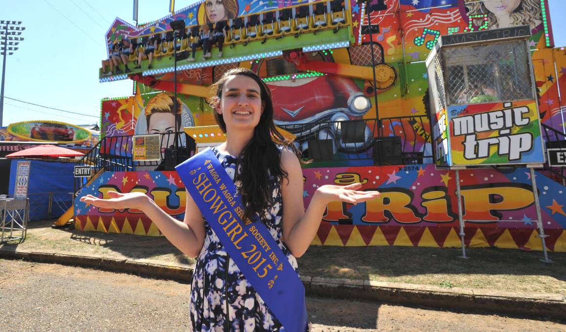 SUCCESS AT LAST: Wagga Showgirl Emma Ball takes in the show atmosphere yesterday on her first day in the role. Picture: Laura Hardwick