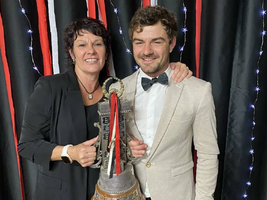 North Wagga best and fairest winner Cayden Winter with his mum Kerry at the Saints' presentation night on Friday. Picture: North Wagga AFC