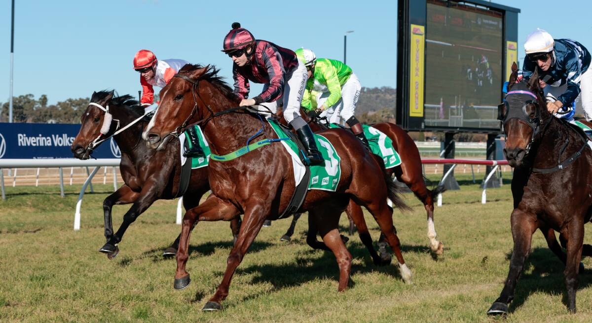 Molly Bourke guides Lipstick Swing (middle) to an all-the-way win at Murrumbidgee Turf Club on Monday. Picture by Bernard Humphreys