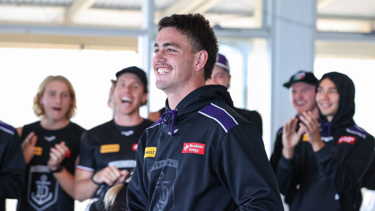 Pat Voss is all smiles after being told of his debut. Picture by Fremantle FC
