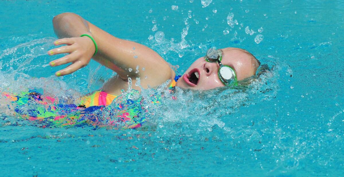 GOING STRONG: Brooke Boxshall, 12, powers through the 50 metre freestyle at the Lutheran Primary School swimming carnival.