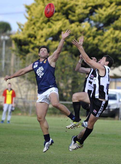 TRIBUNAL BOUND: Coleambally footballer Shane Pound (left) in action against The Rock-Yerong Creek earlier in the year. Pound will front the tribunal on Thursday night. Picture: Les Smith