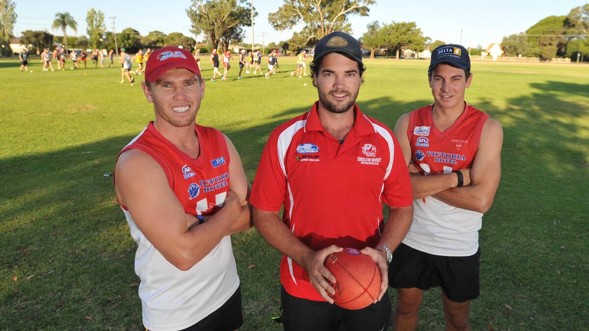DONE WELL: Charles Sturt University assistant coach Jack Egan, coach Ash Weldon and president Tristan Robinson. Picture: Laura Hardwick