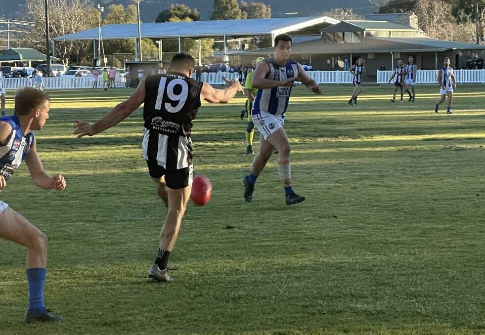 The Rock-Yerong Creek's Tom Yates has a shot on goal in the win over Temora at Victoria Park on Saturday. Picture by TRYCFNC